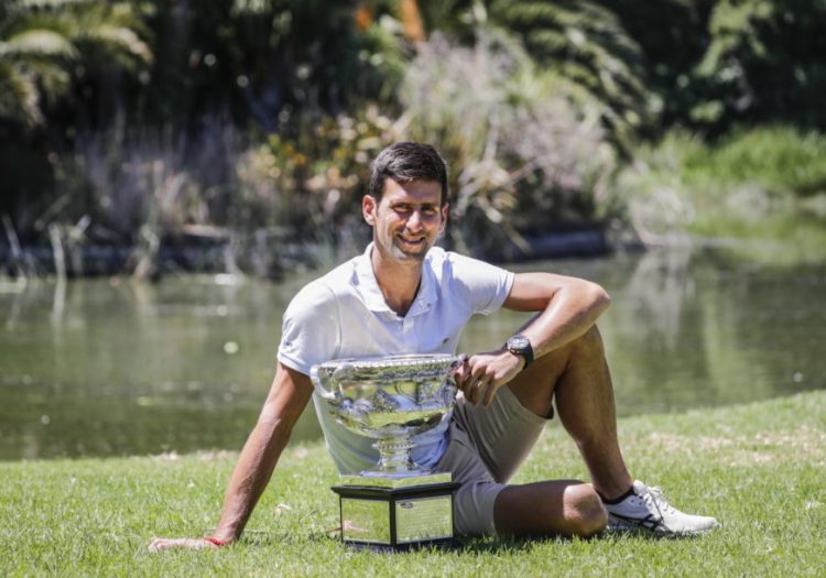 epa07326700 Novak Djokovic of Serbia poses with the Norman Brookes Challenge Cup trophy, during a photo session at Melbourne's Royal Botanic Gardens in Melbourne, Australia, 28 January 2019. Novak defeated Rafael Nadal of Spain in the men's singles final at the Australian Open Grand Slam tennis tournament.  EPA-EFE/MAST IRHAM